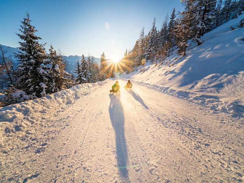 De langste verlichte rodelbaan ter wereld vind je in dit skigebied